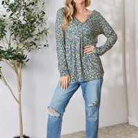 Heimish Full Size Floral Half Button Long Sleeve Blouse